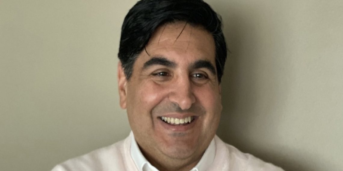 Headshot of Eric Torigian